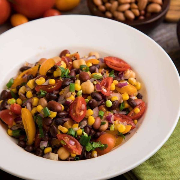 black beans, corn, tomatoes, garbanzo beans, peas, onions and goodness